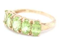 10kt Yellow gold oval Peridot 5 stone ring