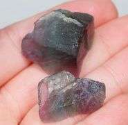 Glowing 80ct rough bi-color Fluorite pair