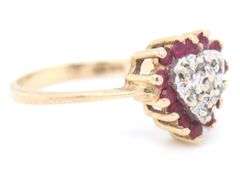 14kt Yellow gold ruby and diamond heart shaped ring