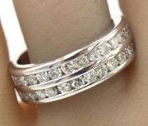 18kt White gold 1.30ctw 2 row channel set diamond band