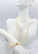 Set of Pearl necklace, bracelet and stud