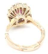 14kt Yellow gold oval ruby and diamond halo ring
