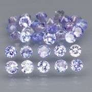 Heavy flashing 3.91ct diamond cut Tanzanite set