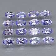 Heavy flashing 3.62ct oval cut Tanzanite set