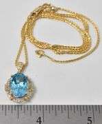 Brilliant Blue Topaz and Diamond Pendant in 14K Yellow Gold