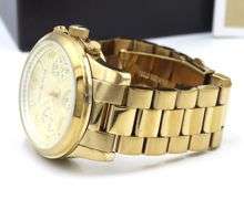 Micheal Kors mid size Chronograph gold tone watch