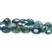 Heated only! 10.40ct bluish green sapphire set