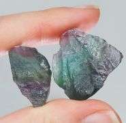 Glowing 80ct rough bi-color Fluorite pair