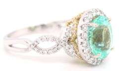 18kt White gold Green Tourmaline and diamond halo cocktail ring