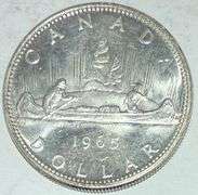 1965 Large  Beed Blunt 5 BU Canada Silver Dollar.