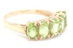 10kt Yellow gold oval Peridot 5 stone ring