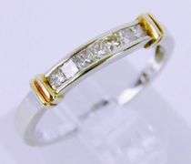 14K Ring with 7 Princess Cut Diamonds, Size 6.5