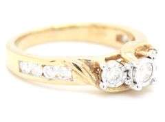 10kt Yellow gold 0.65ctw 3 stone diamond Illusion set engagement ring