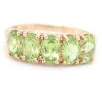 10kt Yellow gold oval Peridot 5 stone ring
