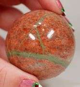 Eye catching 880ct Unakite sphere