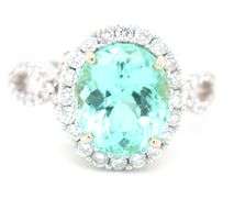 18kt White gold Green Tourmaline and diamond halo cocktail ring