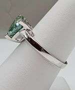 Sparkling 4.25 Ct VVs1 Trillion Cut Emerald Green Moissanite Ring