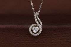 Beautiful center stone dancing pendant in solid sterling silver