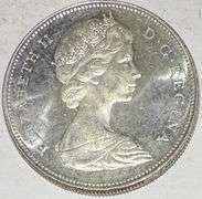 1965 Large  Beed Blunt 5 BU Canada Silver Dollar.
