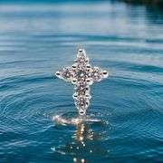 Sparkling 14 Kt White Gold Plated Simulated Diamond Cross Pendant