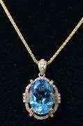Brilliant Blue Topaz and Diamond Pendant in 14K Yellow Gold