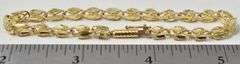 Dazzling Fancy Link Bracelet in 14K Yellow Gold