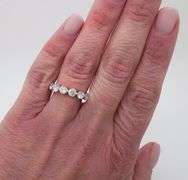 1.50CTW Shared Prong Seven Stone Diamond Band