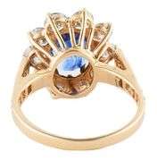 1.75ct Oval Sapphire and 2.00ctw Diamond Starburst Frame Ring in 14K
