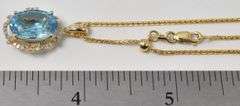 Brilliant Blue Topaz and Diamond Pendant in 14K Yellow Gold