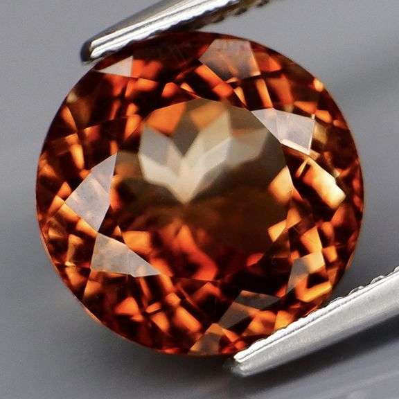 Simply superb 7.03ct eye clean Imperial Topaz solitaire