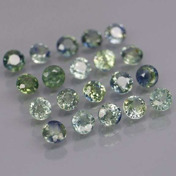Heated only! 3.55ct blue green Sapphire set
