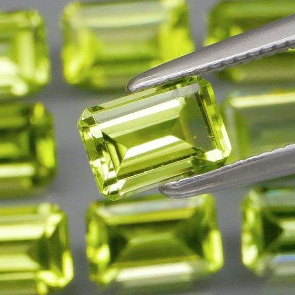 Emerald cut! Unheated! 5.53ct Peridot set