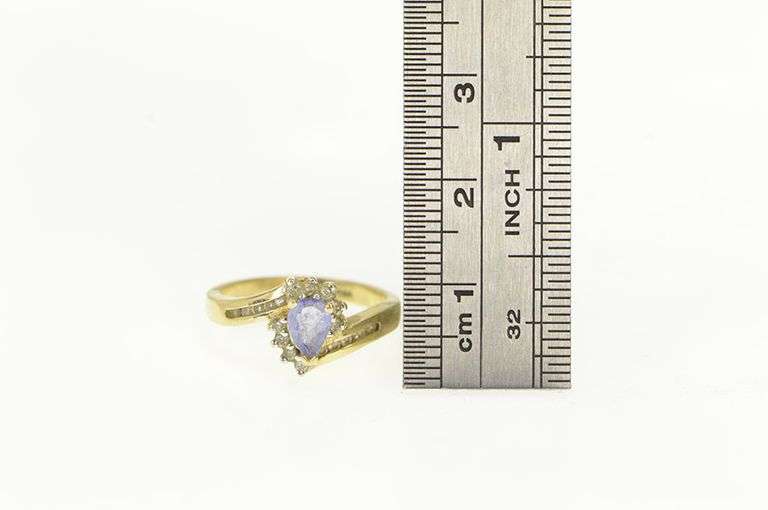 14K Yellow Gold Pear Cut Tanzanite Diamond Halo Ring