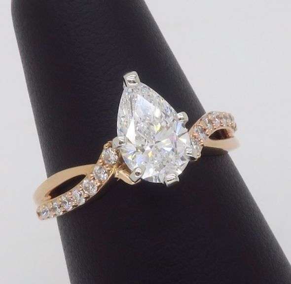 Certified 1.31CTW Pear Diamond Engagement Ring