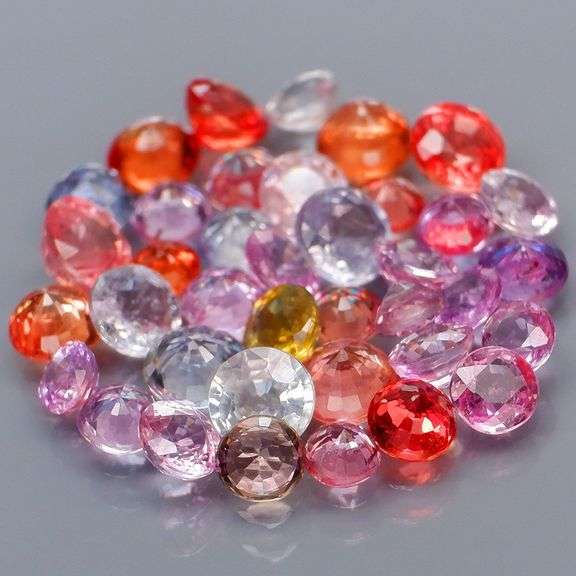 Glittering 38 piece 9.38ct fancy color Sapphire set