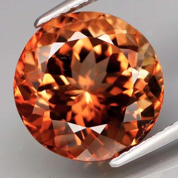 Rich red amber 7.79ct Imperial Topaz solitaire