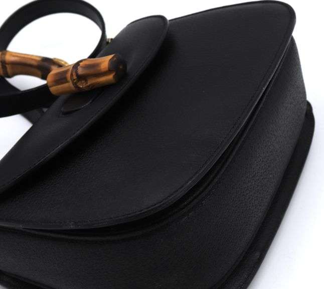 Authentic Gucci black leather purse with Bamboo top handle