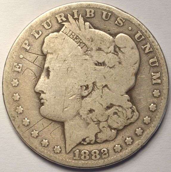 1882-CC Morgan Silver Dollar, Circulated, Damaged.