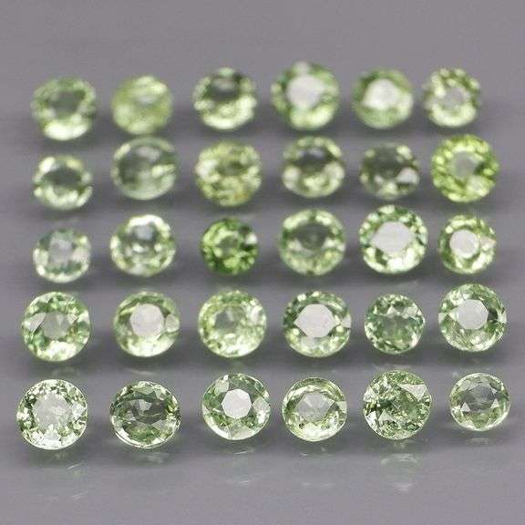 Awesome 4.06ct diamond cut GREEN Sapphire set