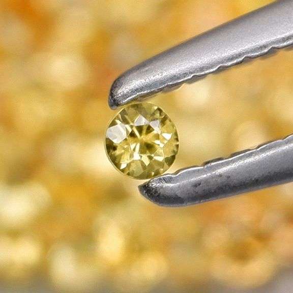Fantastic 4.71ct diamond cut yellow Sapphire set
