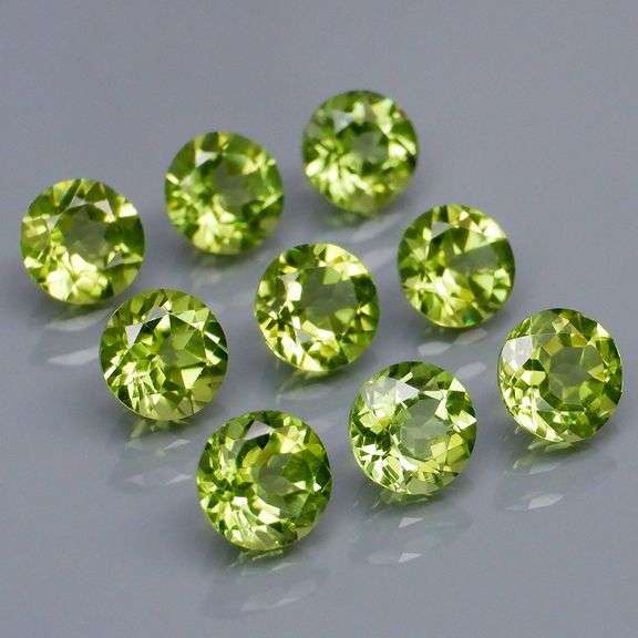 Dazzling 4.90ct untreated apple green Peridot set