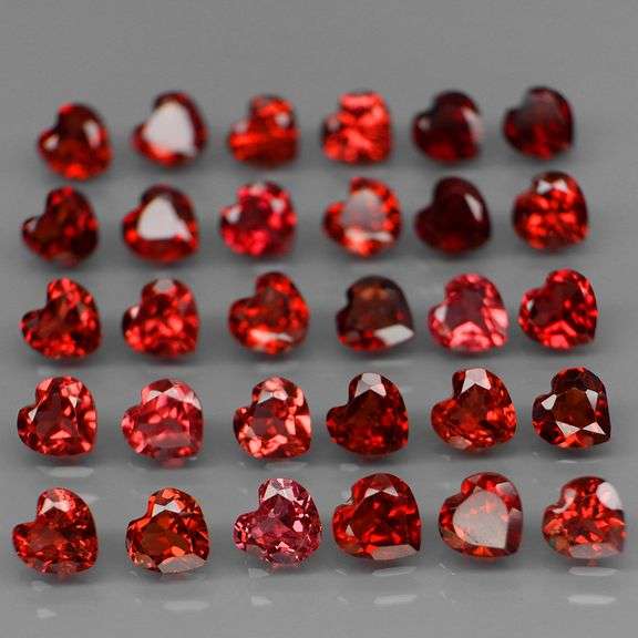 Lovely 9.20ct heart cut cherry red Garnet set