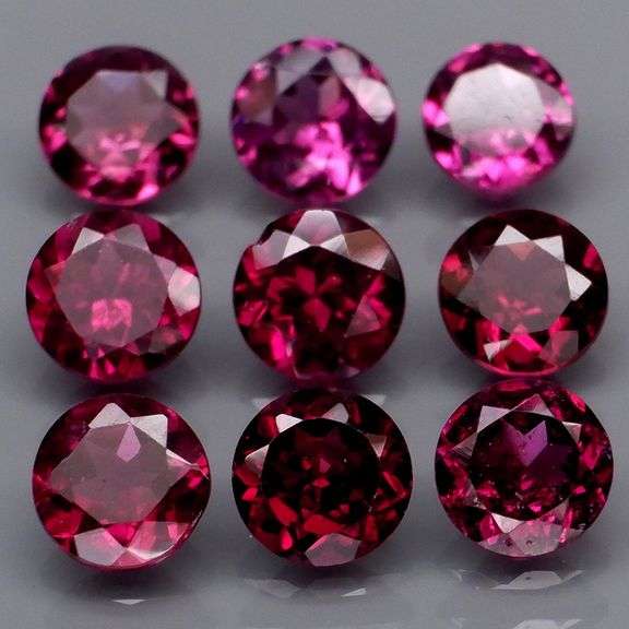 Rich 4.93ct round cut violet pink Rodolite Garnet set