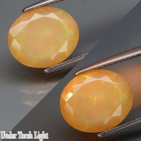 Smoldering flashing 2.12ct floral patterned faceted Opal