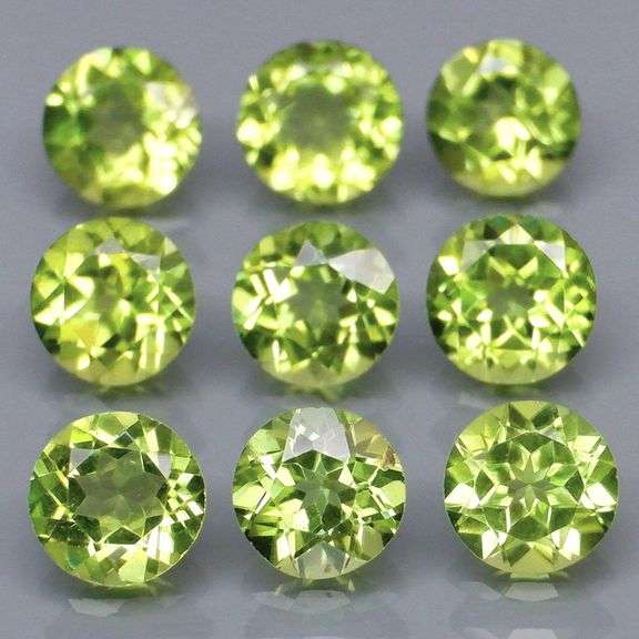 Dazzling 4.98ct untreated apple green Peridot set
