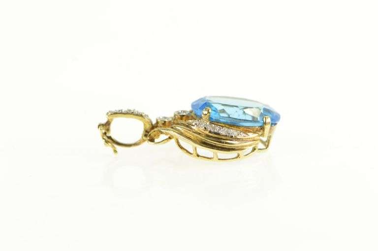 14K Yellow Gold Oval Blue Topaz Diamond Accent Elaborate Pendant
