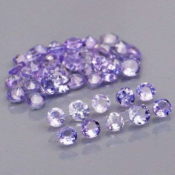 Non stop flashing 3.85ct diamond cut Tanzanite set