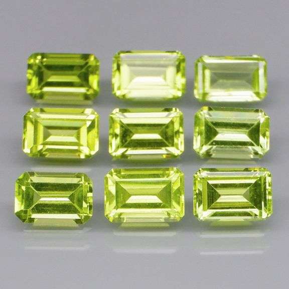 Emerald cut! Unheated! 5.53ct Peridot set