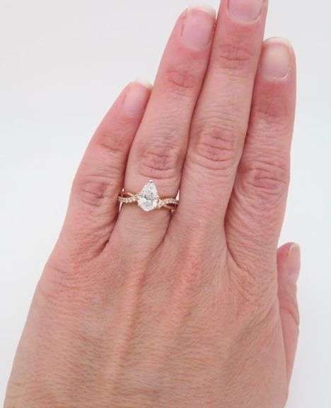 Certified 1.31CTW Pear Diamond Engagement Ring