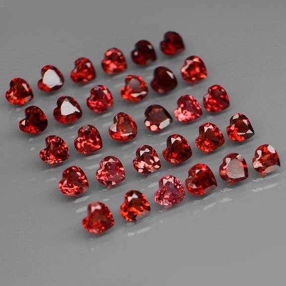Lovely 9.20ct heart cut cherry red Garnet set